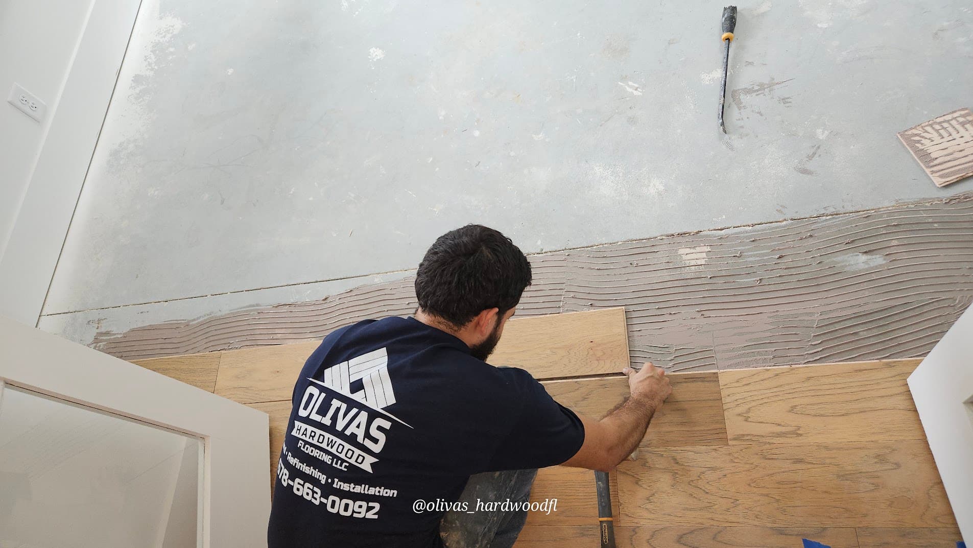 Olivas Hardwood Flooring crew installing engineered hardwood in Marietta GA