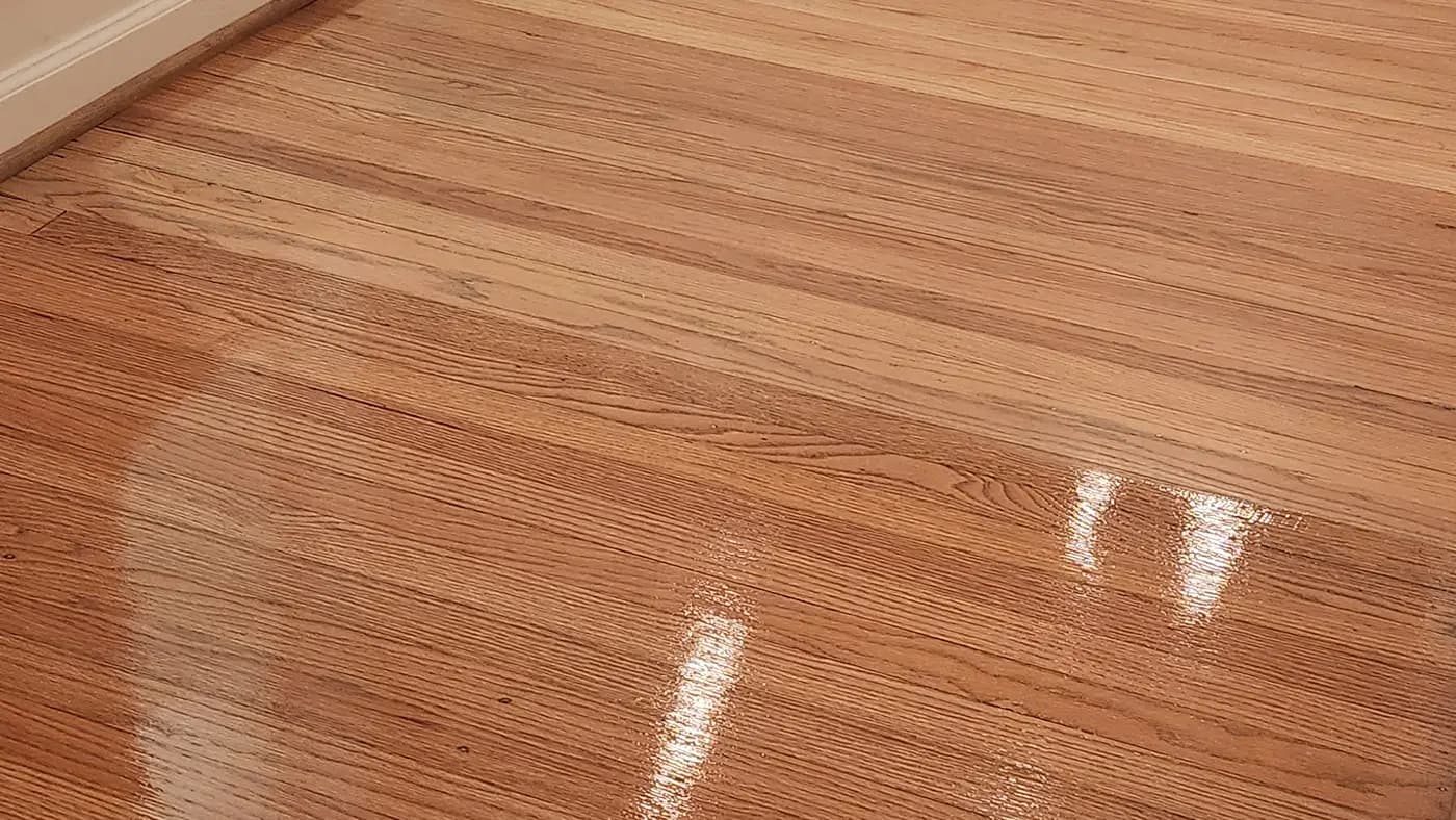 Hardwood floor installation in progress in Metro Atlanta GA — planks being laid over subfloor