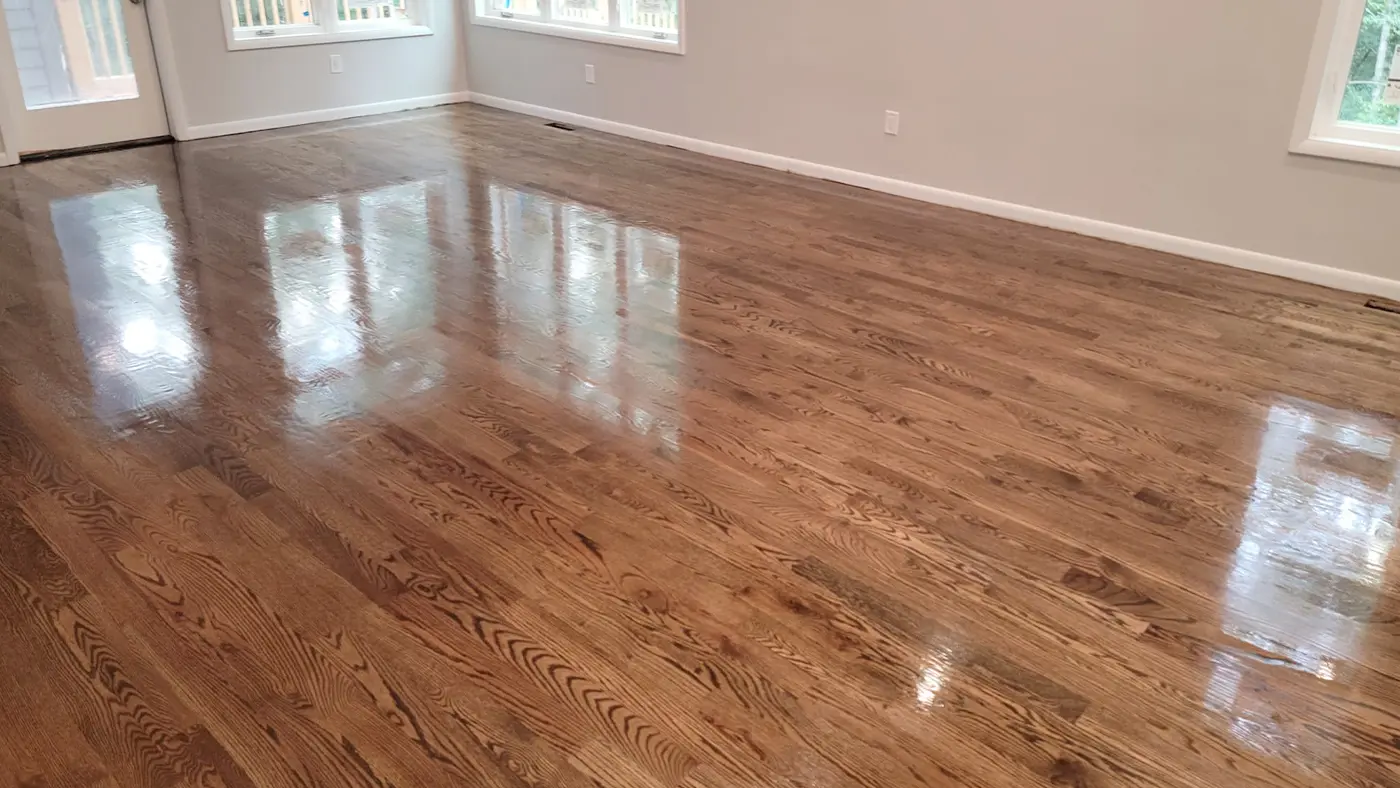 Pre-finished hardwood flooring showing consistent factory-applied finish