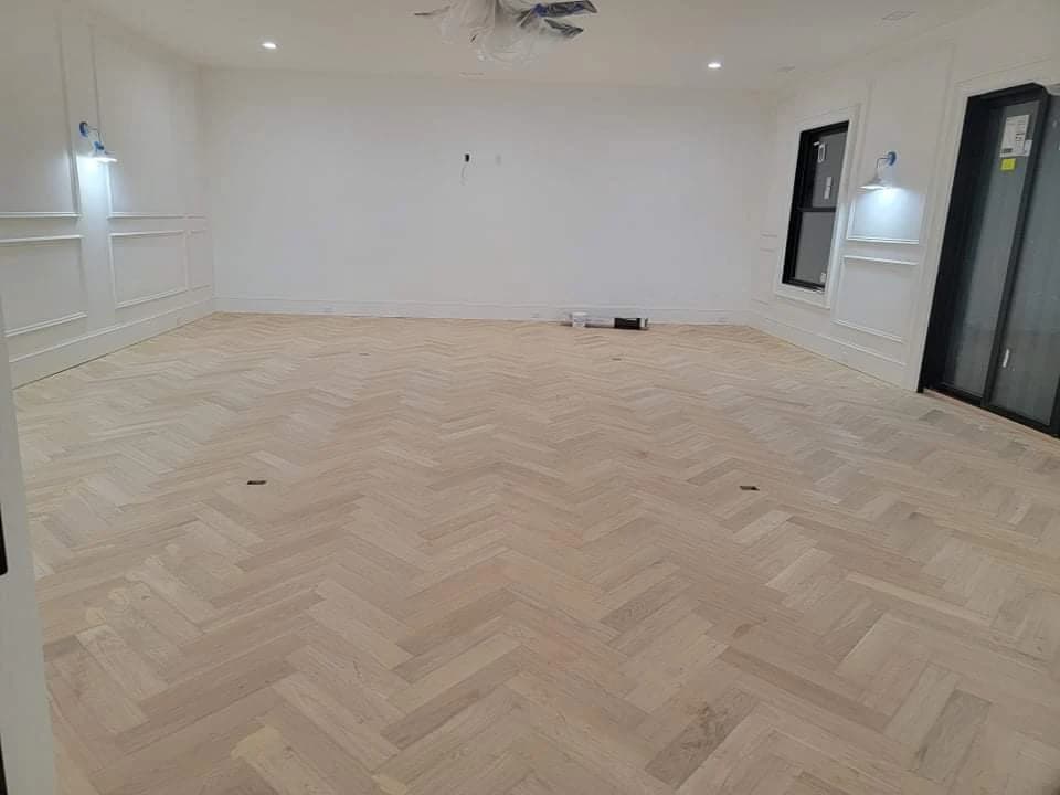 Herringbone hardwood floor installation in Metro Atlanta GA — red oak herringbone pattern