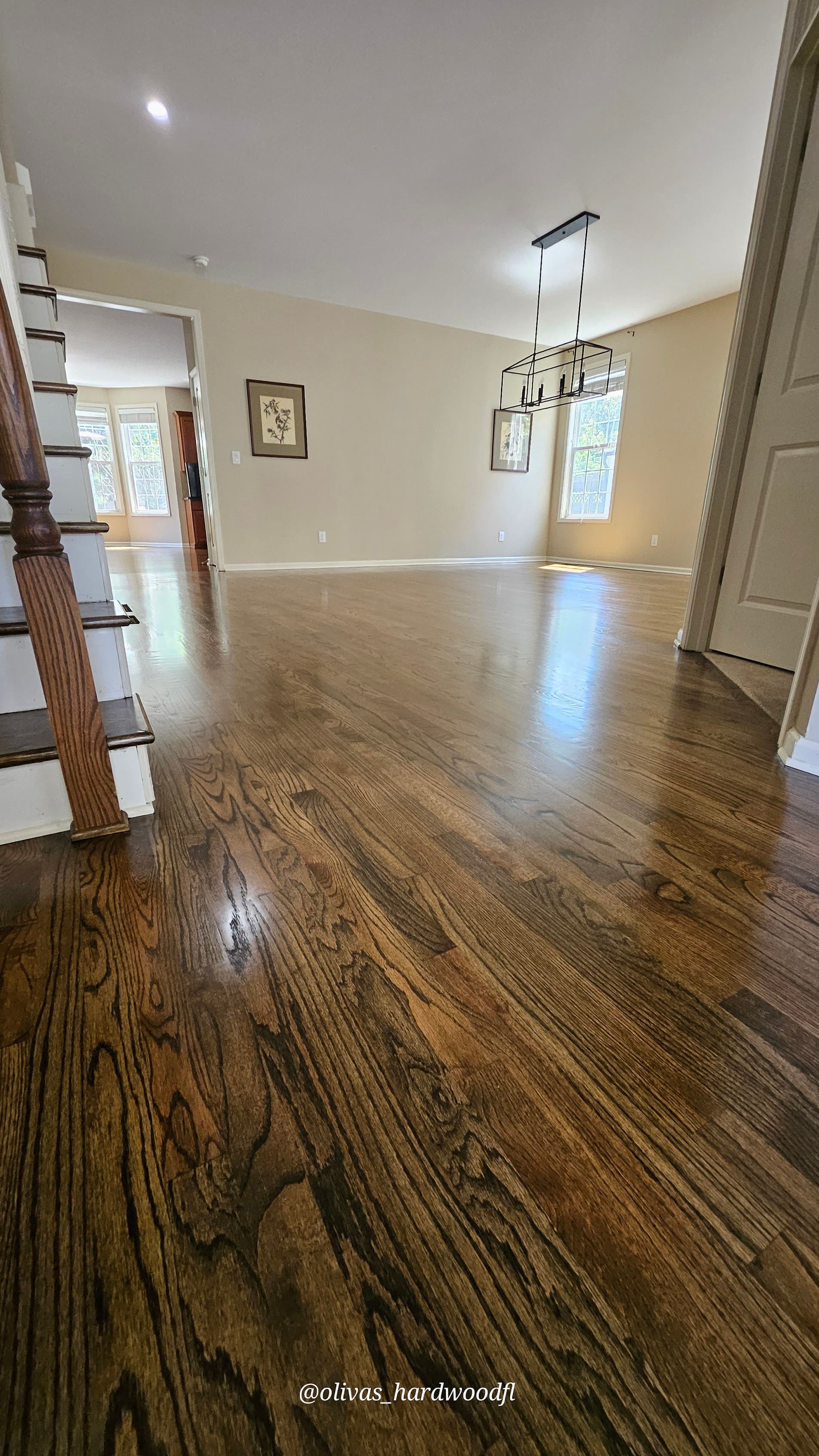 Hardwood floor refinishing in Gwinnett County GA — dark espresso stain oak living room