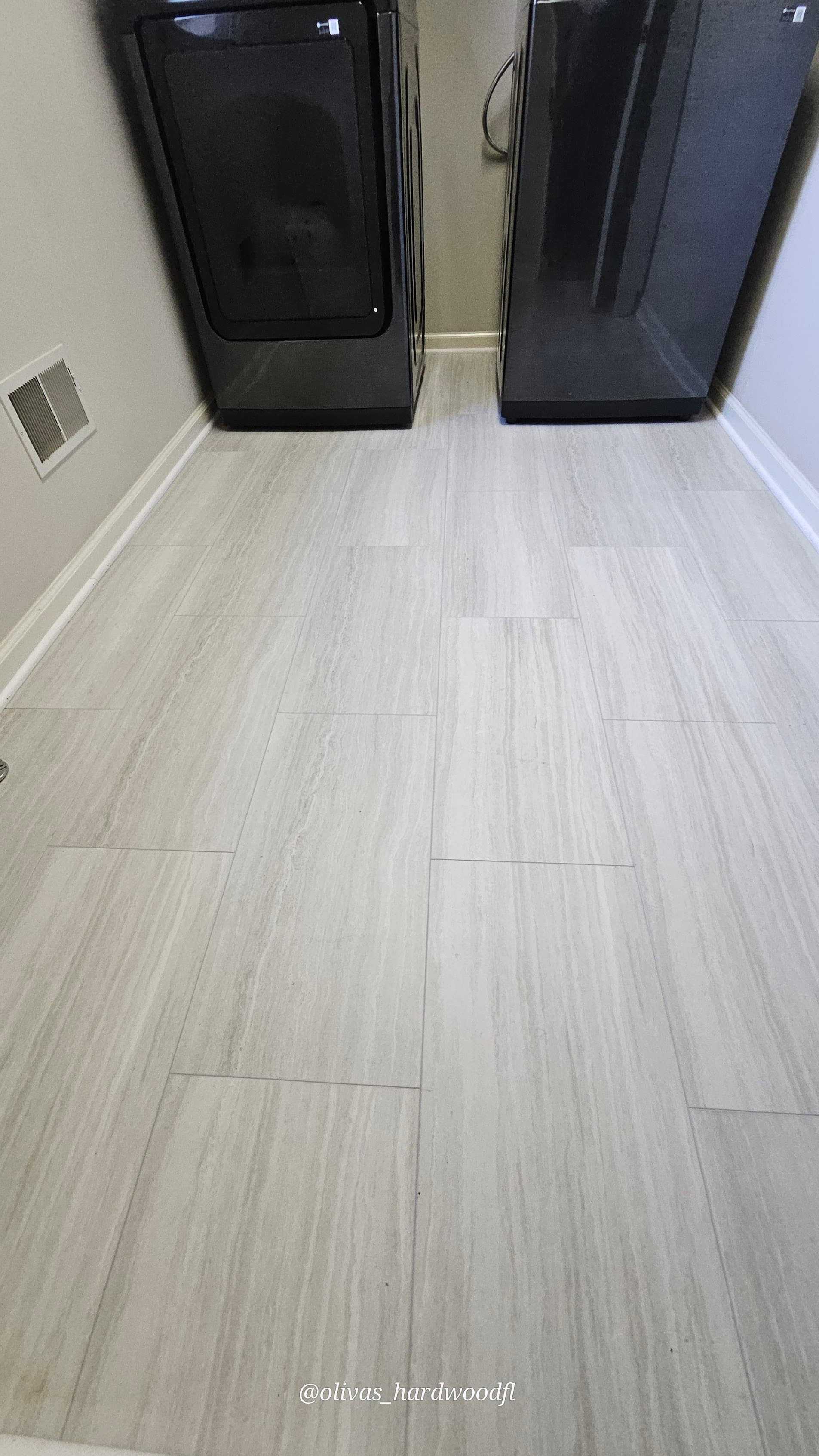 Luxury vinyl tile flooring in Duluth GA — stone-look LVT installed in laundry room