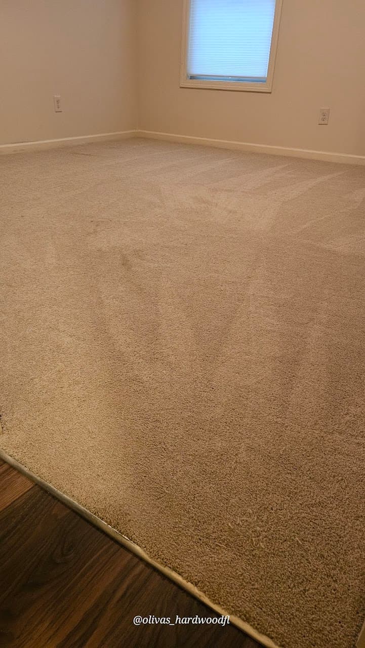 Carpet-to-hardwood transition in a Lawrenceville GA bedroom
