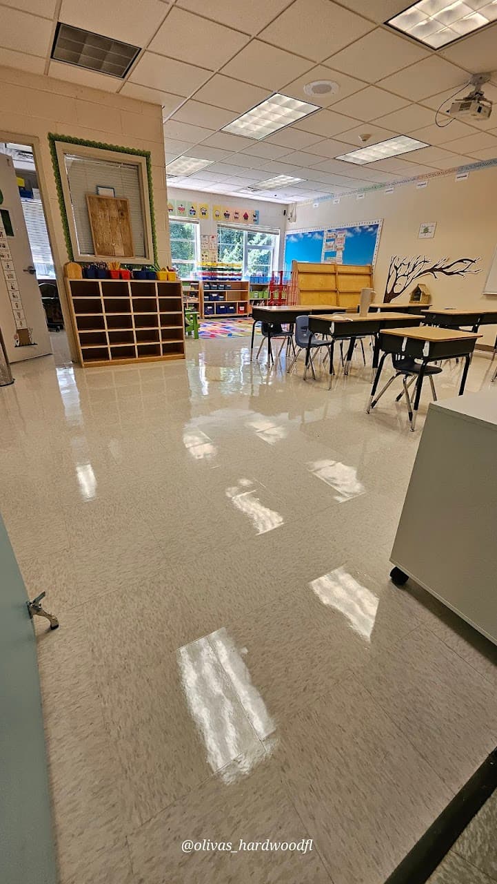 Commercial VCT floor waxing in a school classroom