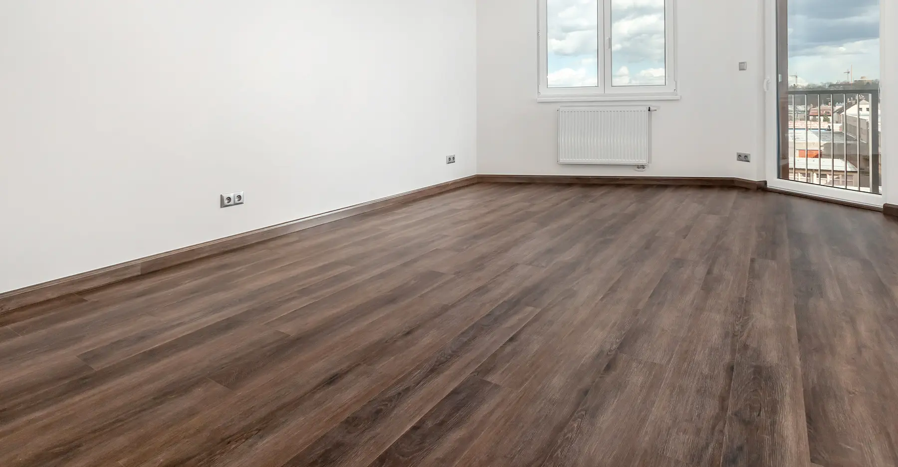 Luxury vinyl plank flooring installed in a modern kitchen